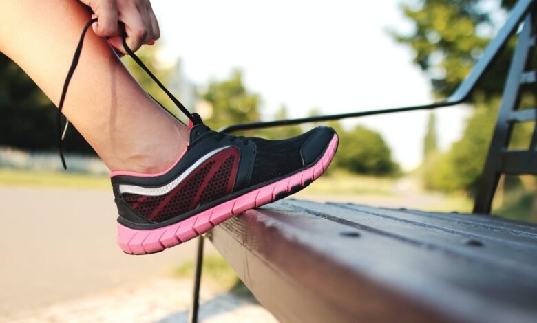 person foot on bench